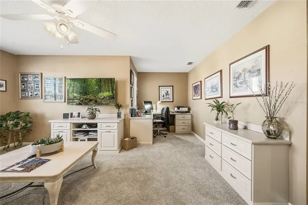 a bedroom with bed and a window