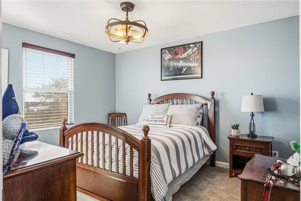 a living room with patio furniture