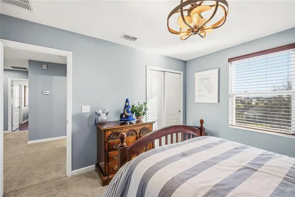 a view of a balcony with chairs and a table