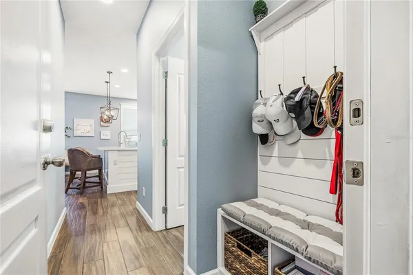 an aerial view of residential building and lake