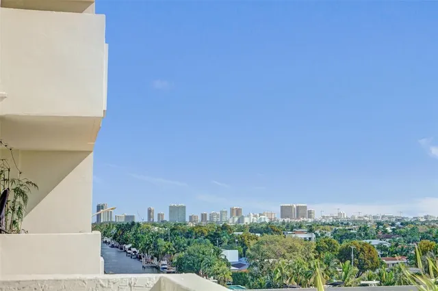a view of a city with tall buildings in the background