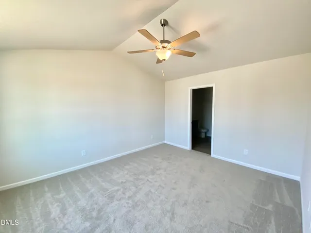 a bathroom with a sink a mirror and a shower