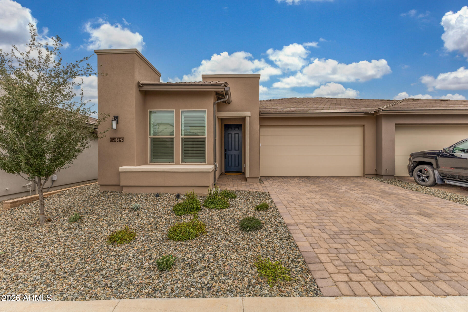 18325 East Spring Valley Court Rio Verde, AZ 85263 - Photo 1 of 50 a front view of a house with a yard