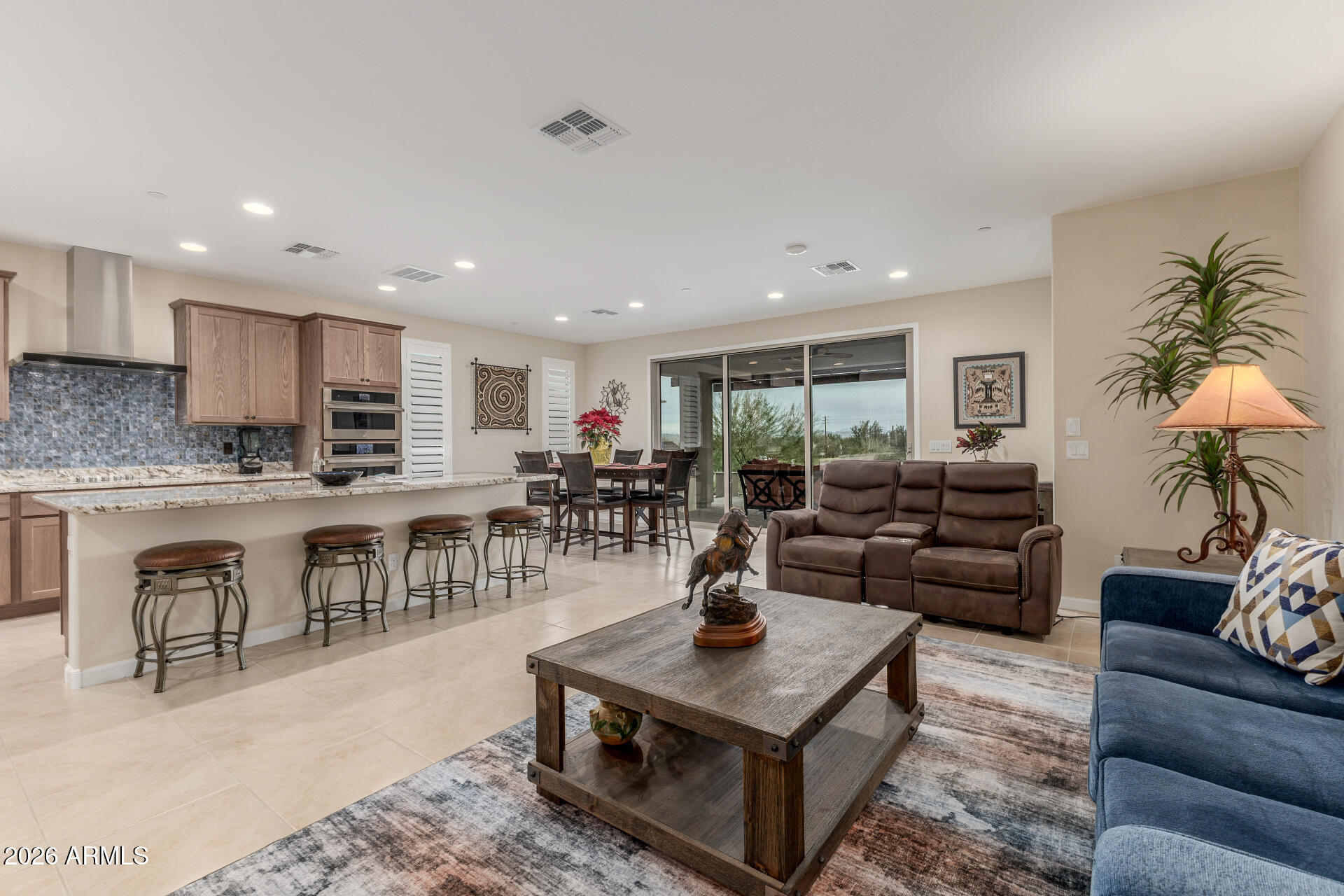 18325 East Spring Valley Court Rio Verde, AZ 85263 - Photo 11 of 50 a living room with furniture and a large window