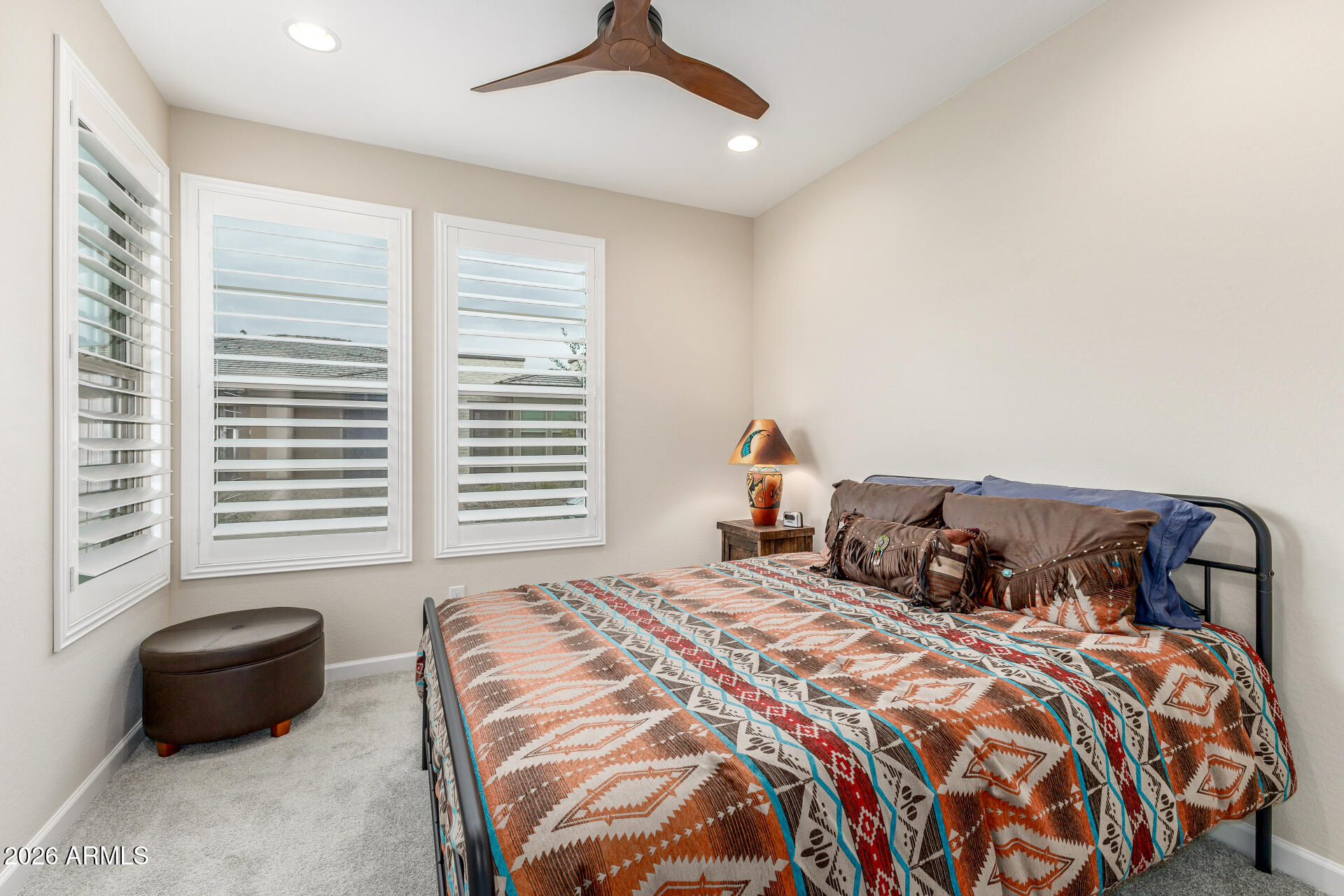 18325 East Spring Valley Court Rio Verde, AZ 85263 - Photo 30 of 50 a bedroom with a bed and a couch