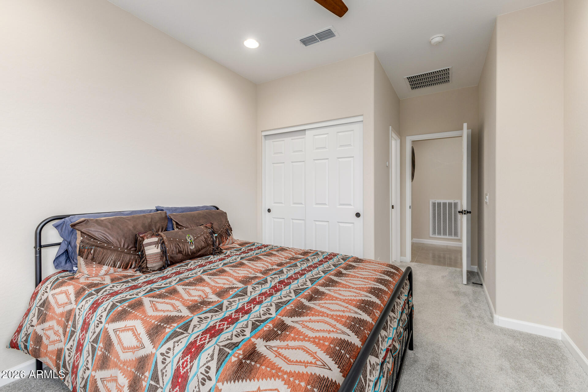 18325 East Spring Valley Court Rio Verde, AZ 85263 - Photo 31 of 50 a bedroom with a bed and a mirror