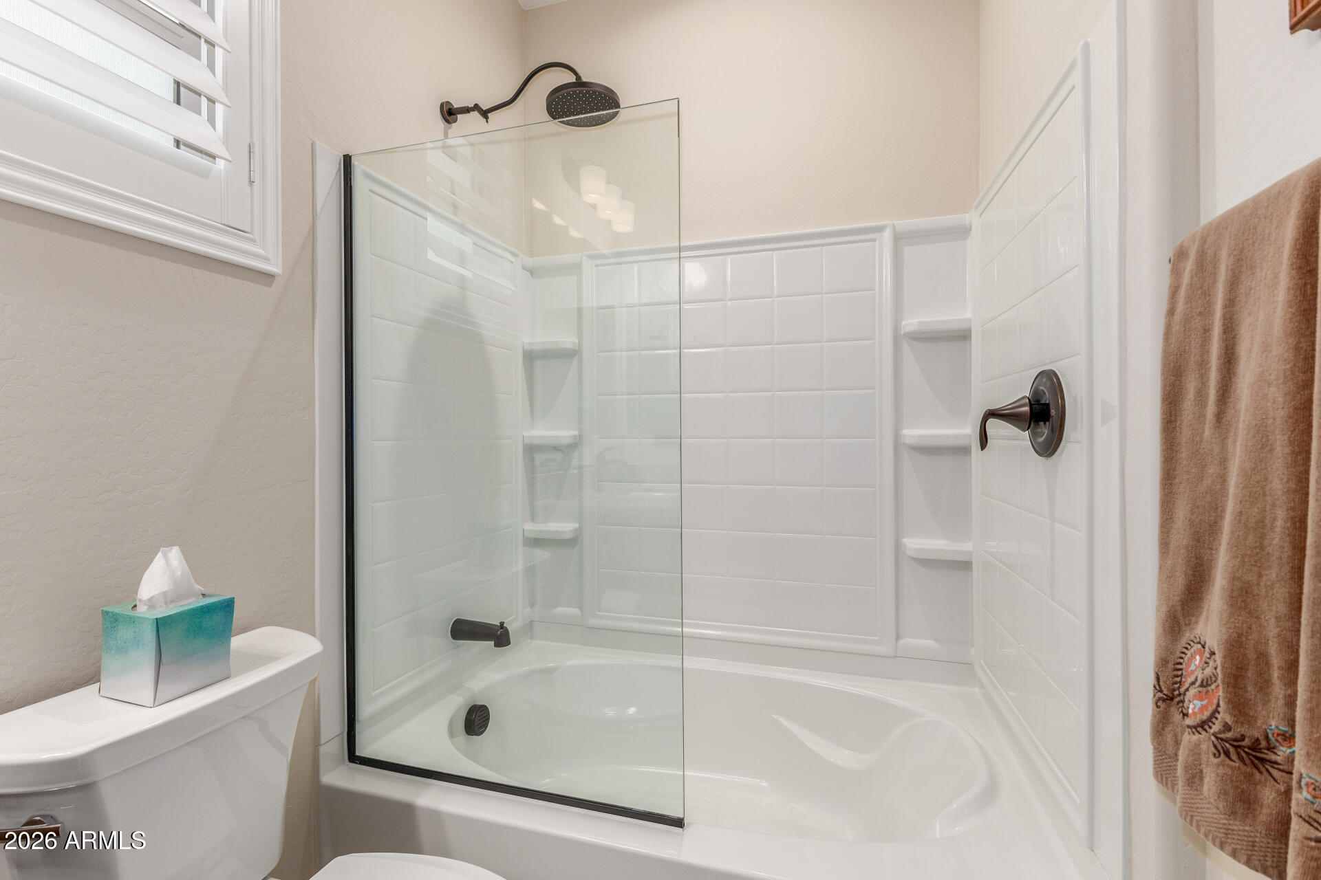 18325 East Spring Valley Court Rio Verde, AZ 85263 - Photo 33 of 50 a bathroom with a bathtub and a shower