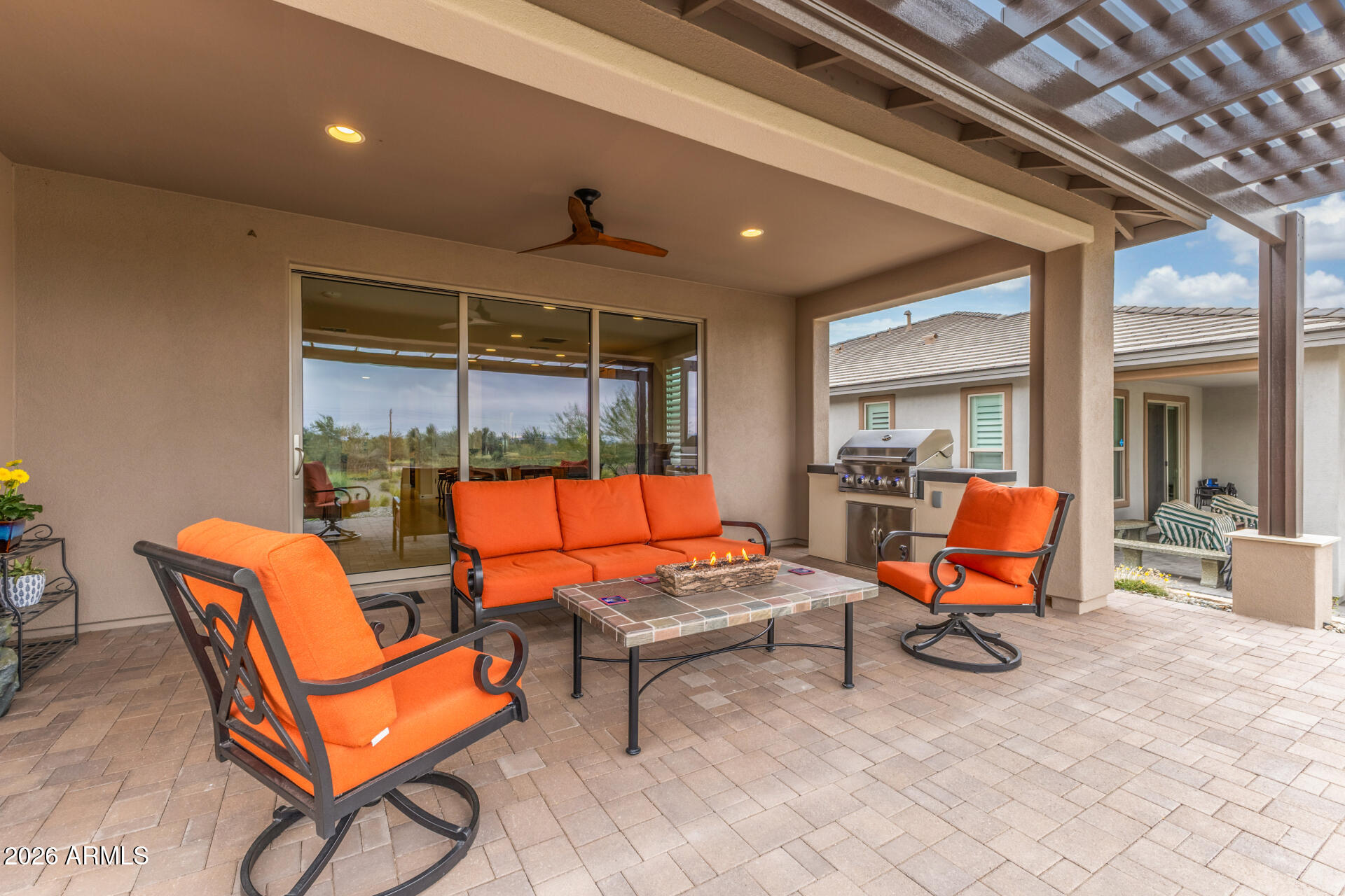 18325 East Spring Valley Court Rio Verde, AZ 85263 - Photo 37 of 50 a outdoor space with a couch and chairs