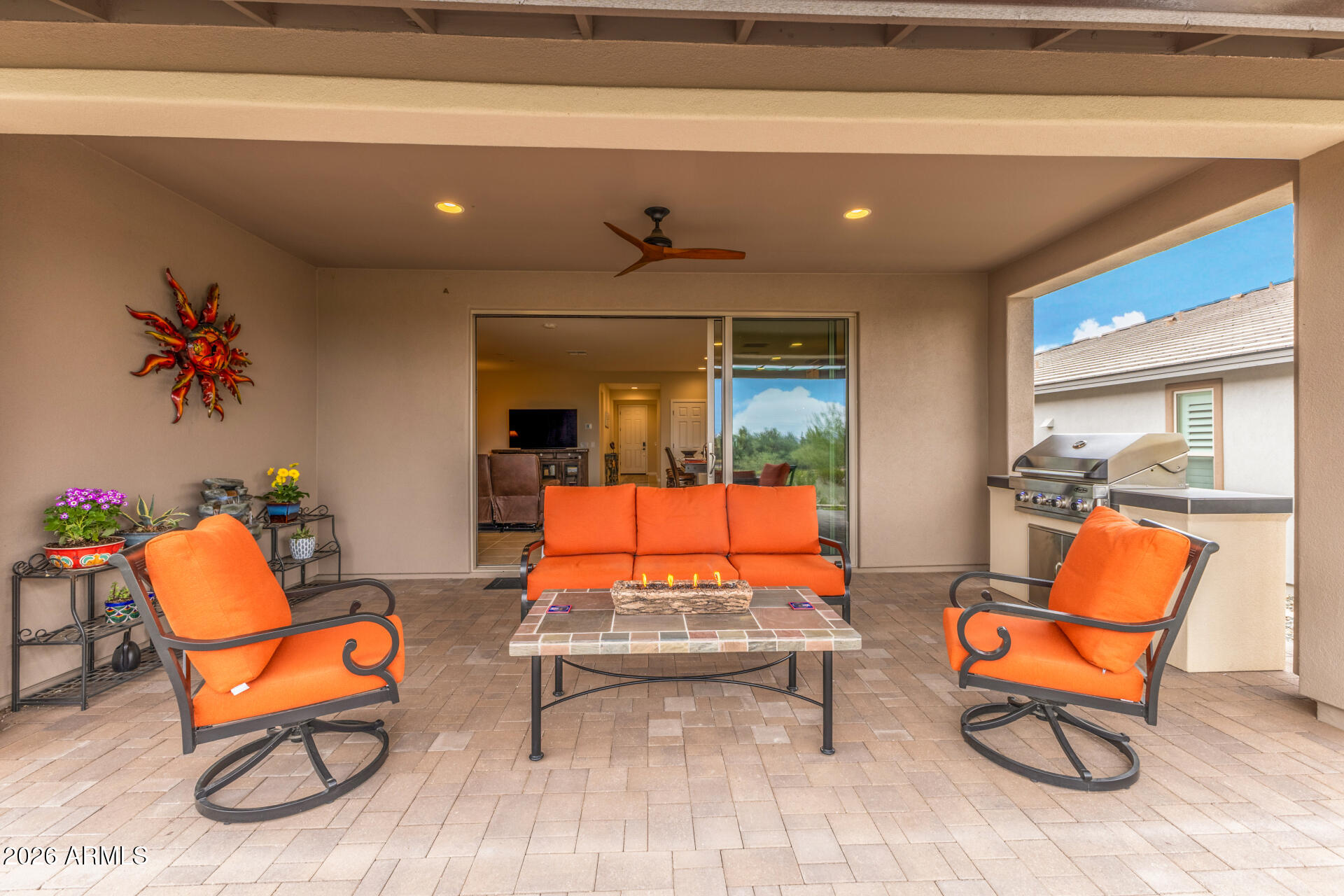 18325 East Spring Valley Court Rio Verde, AZ 85263 - Photo 41 of 50 a living room with furniture and a flat screen tv with kitchen view