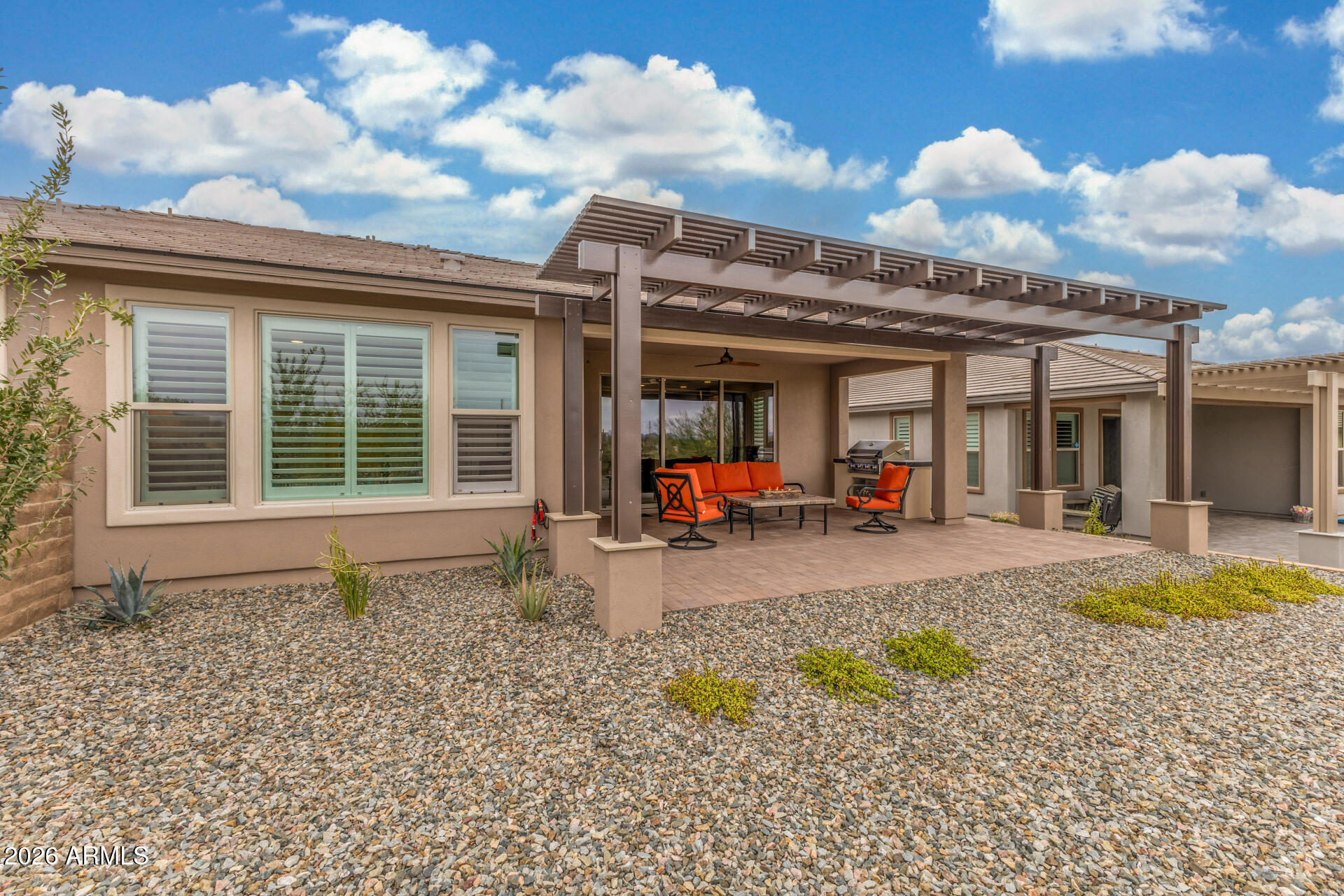 18325 East Spring Valley Court Rio Verde, AZ 85263 - Photo 44 of 50 a view of a house with sink backyard and porch