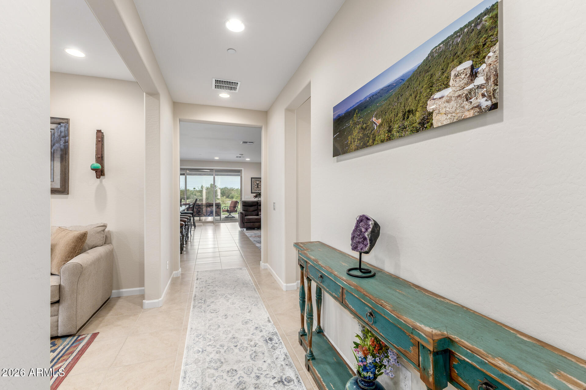 18325 East Spring Valley Court Rio Verde, AZ 85263 - Photo 5 of 50 a hallway with a couch