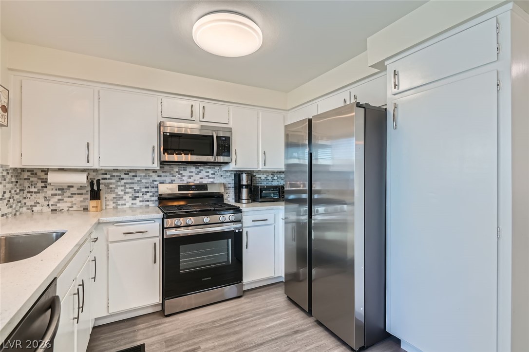 3665 Bronco Road Las Vegas, NV 89103 - Photo 11 of 28 A well-equipped culinary space awaits with stainless steel appliances and ample cabinetry.