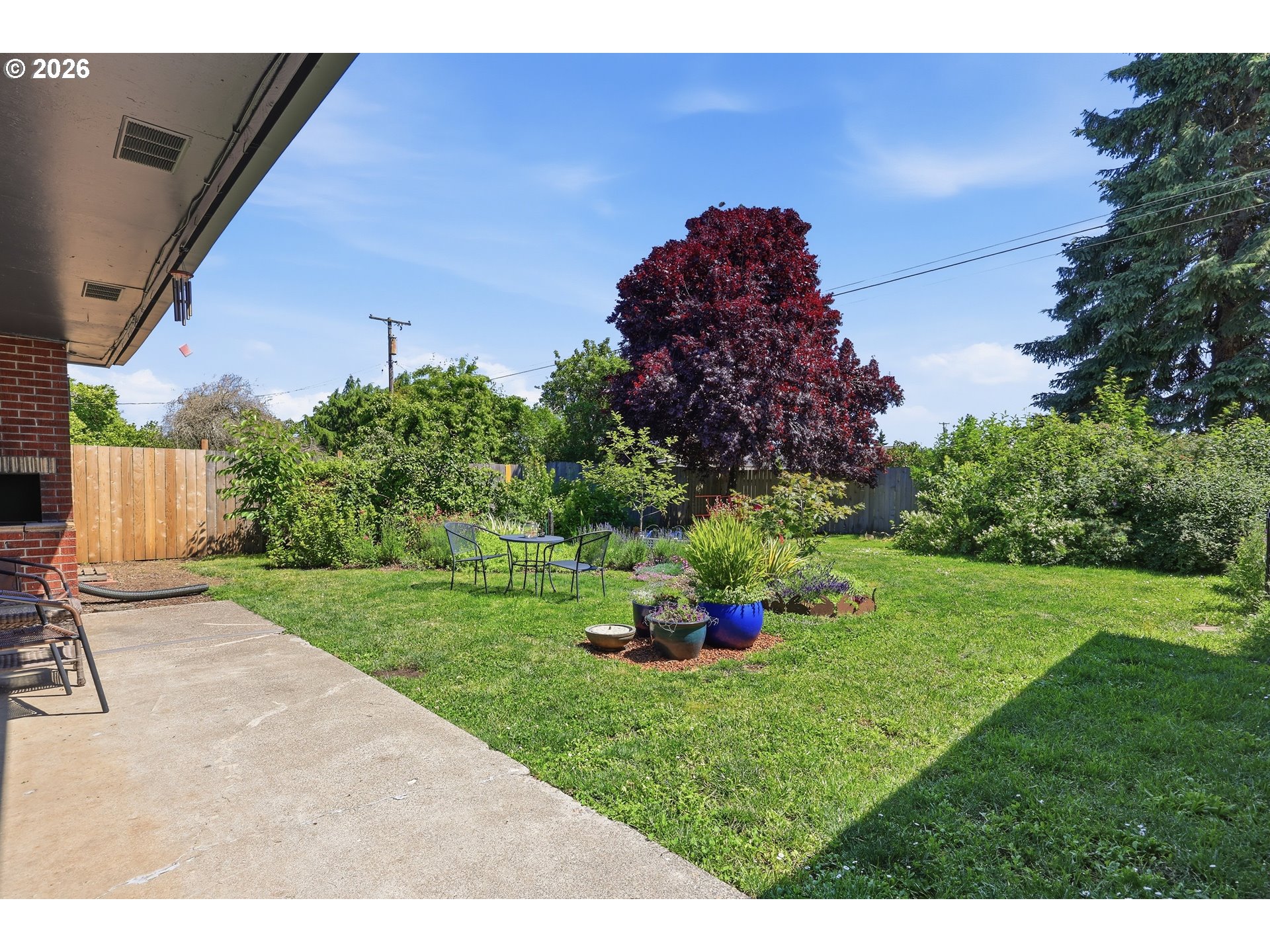 65 Greenvale Drive Springfield, OR 97477 - Photo 29 of 42 a green field with lots of trees in the background