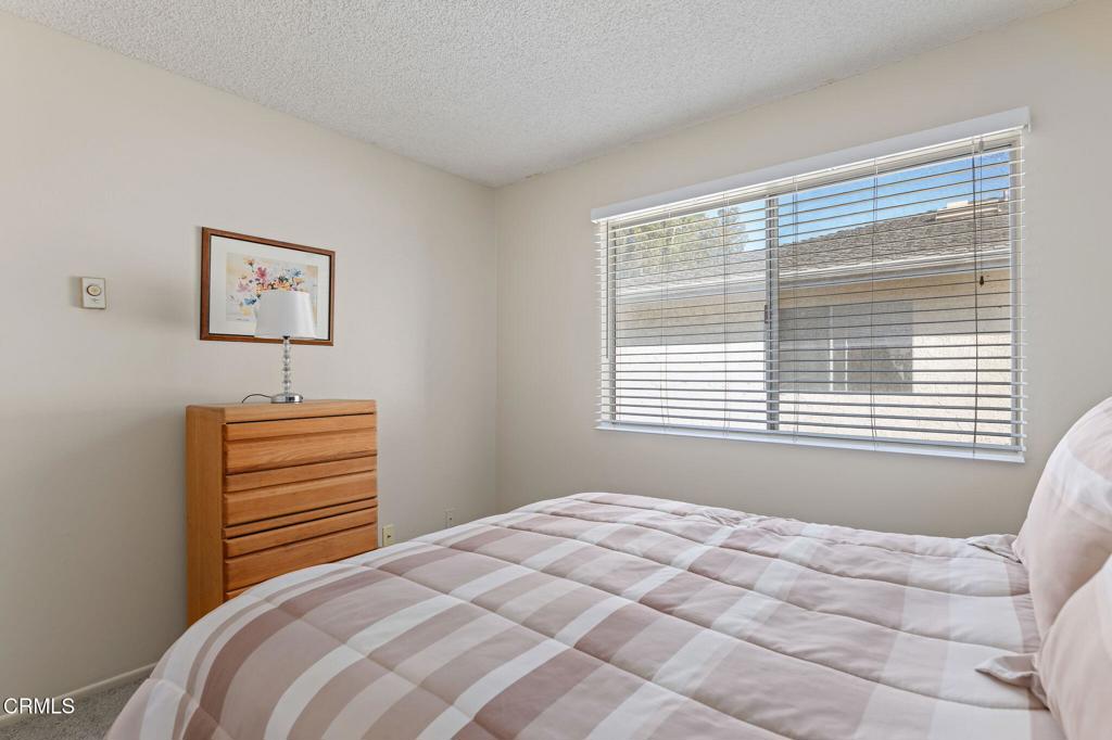 2606 Rudder Avenue Port Hueneme, CA 93041 - Photo 13 of 16 a bedroom with a bed and a window