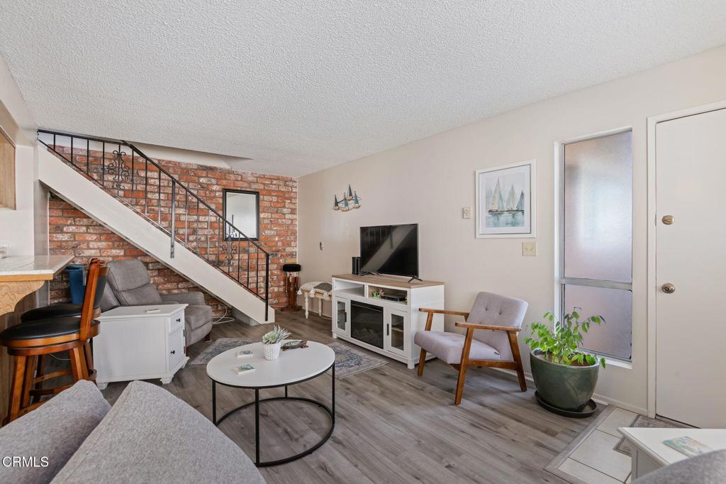 2606 Rudder Avenue Port Hueneme, CA 93041 - Photo 3 of 16 a living room with furniture and a potted plant