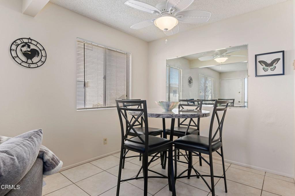 2606 Rudder Avenue Port Hueneme, CA 93041 - Photo 5 of 16 a view of a dining room with furniture and a chandelier