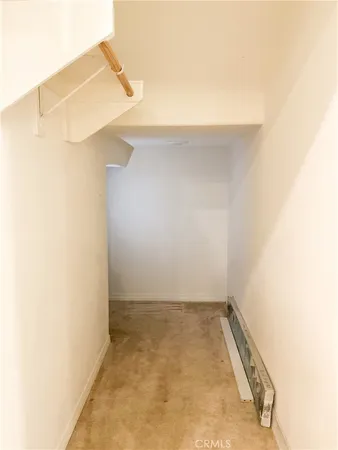 a kitchen with stainless steel appliances granite countertop a refrigerator a stove and a sink