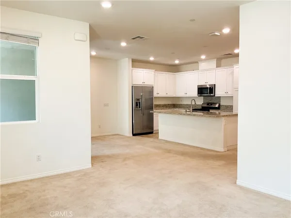 view of empty room with window