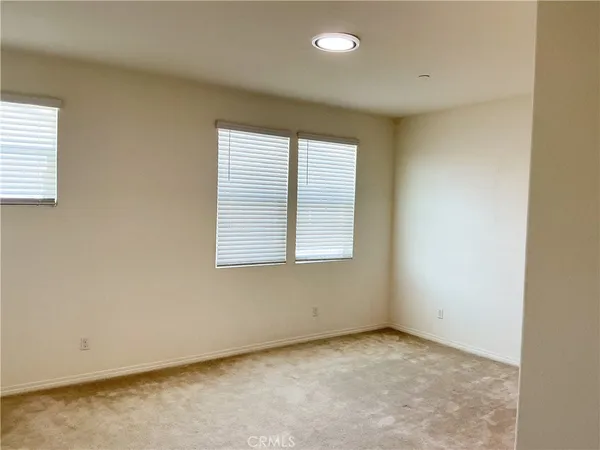 a bathroom with a tub a shower and a sink