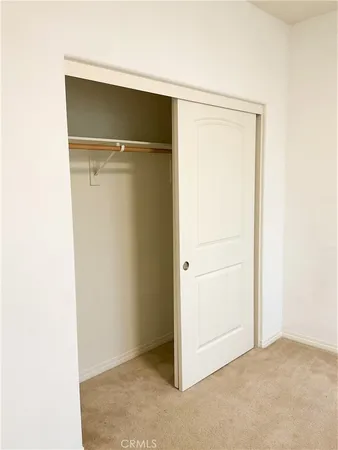 a front view of a building with a large windows