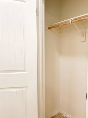 a wooden door in a corridor