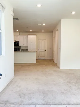 a bathroom with a sink a mirror and toilet