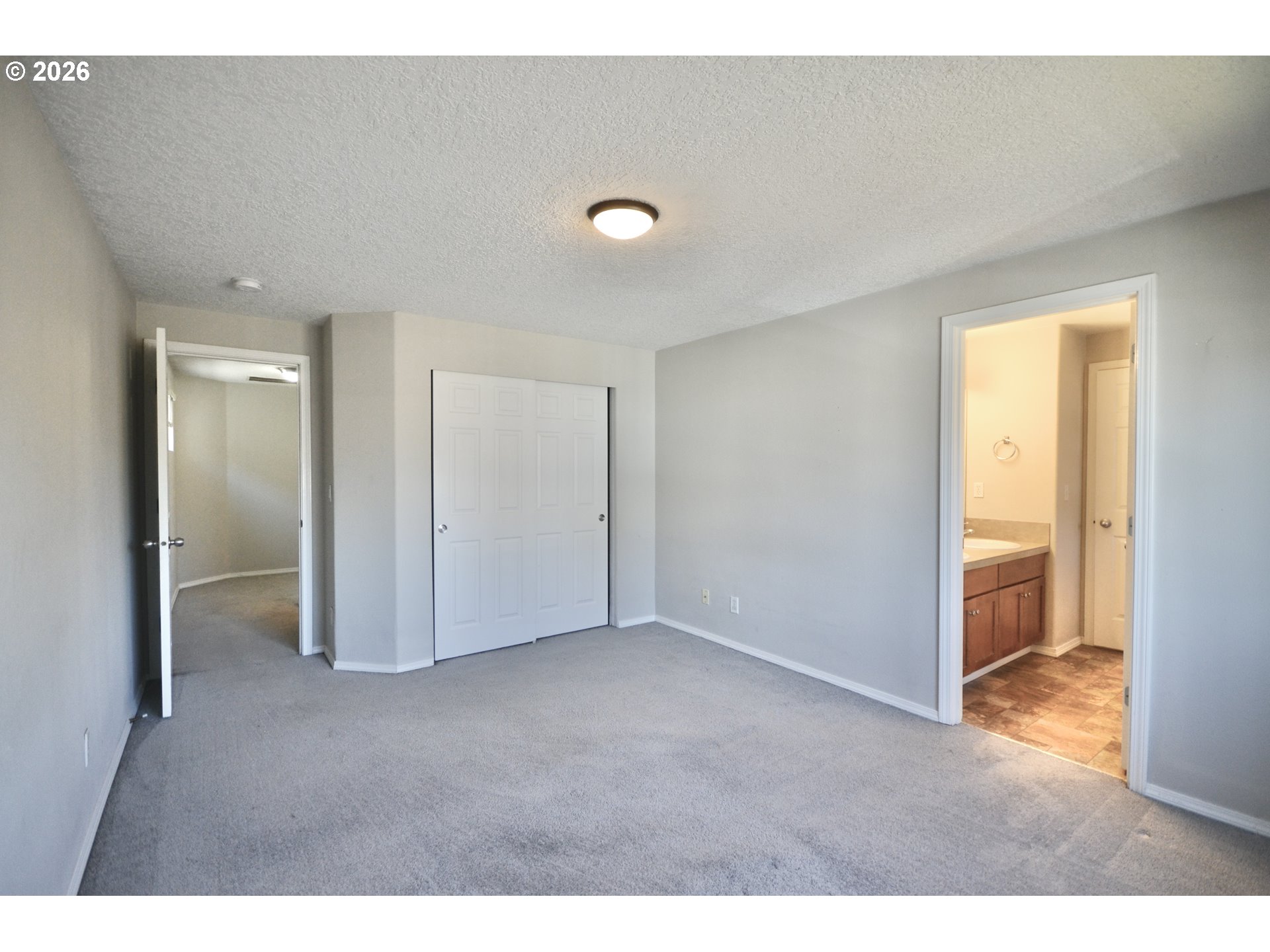 20583 Southwest Tesoro Court Beaverton, OR 97003 - Photo 15 of 28 a view of an empty room and a window