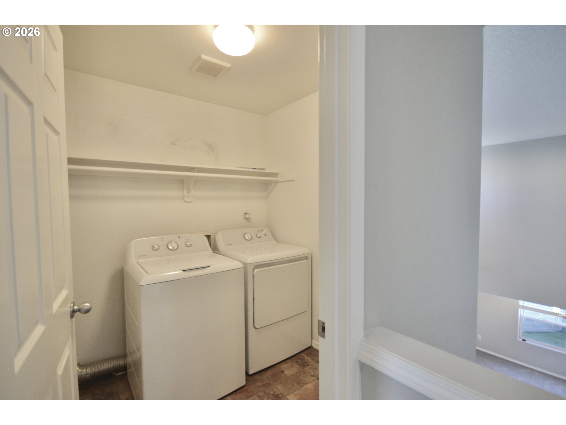 20583 Southwest Tesoro Court Beaverton, OR 97003 - Photo 19 of 28 a utility room with dryer and washer