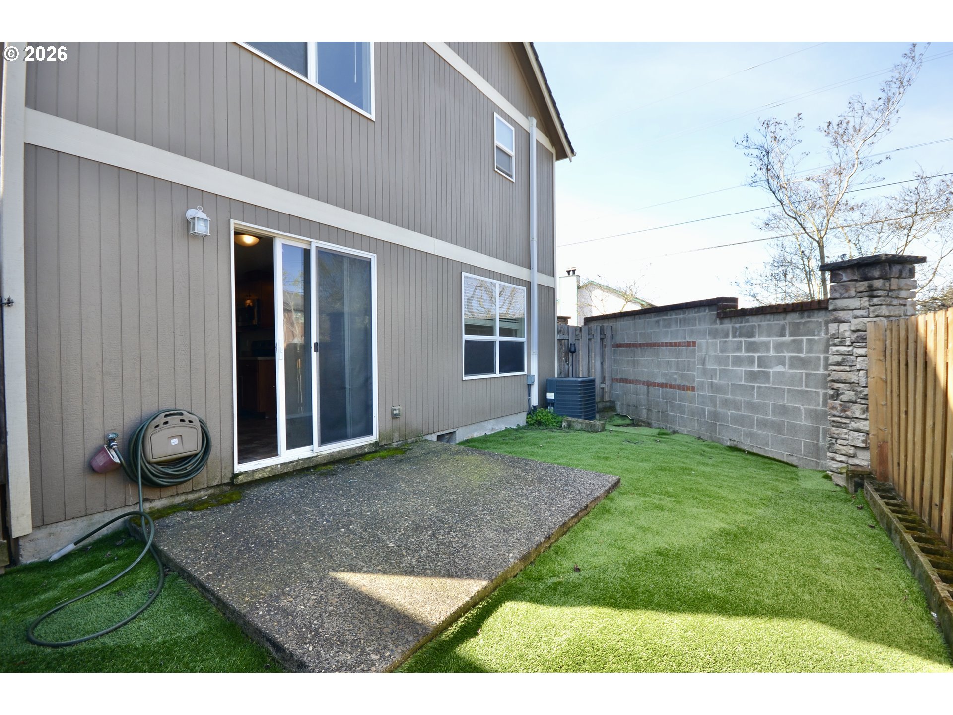 20583 Southwest Tesoro Court Beaverton, OR 97003 - Photo 25 of 28 a backyard of a house with wooden fence