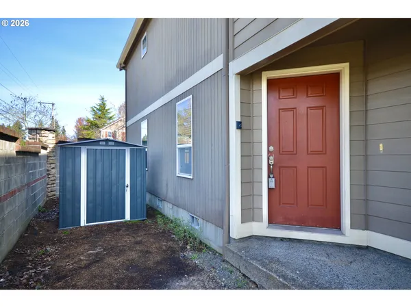 a view of outdoor space and wooden door
