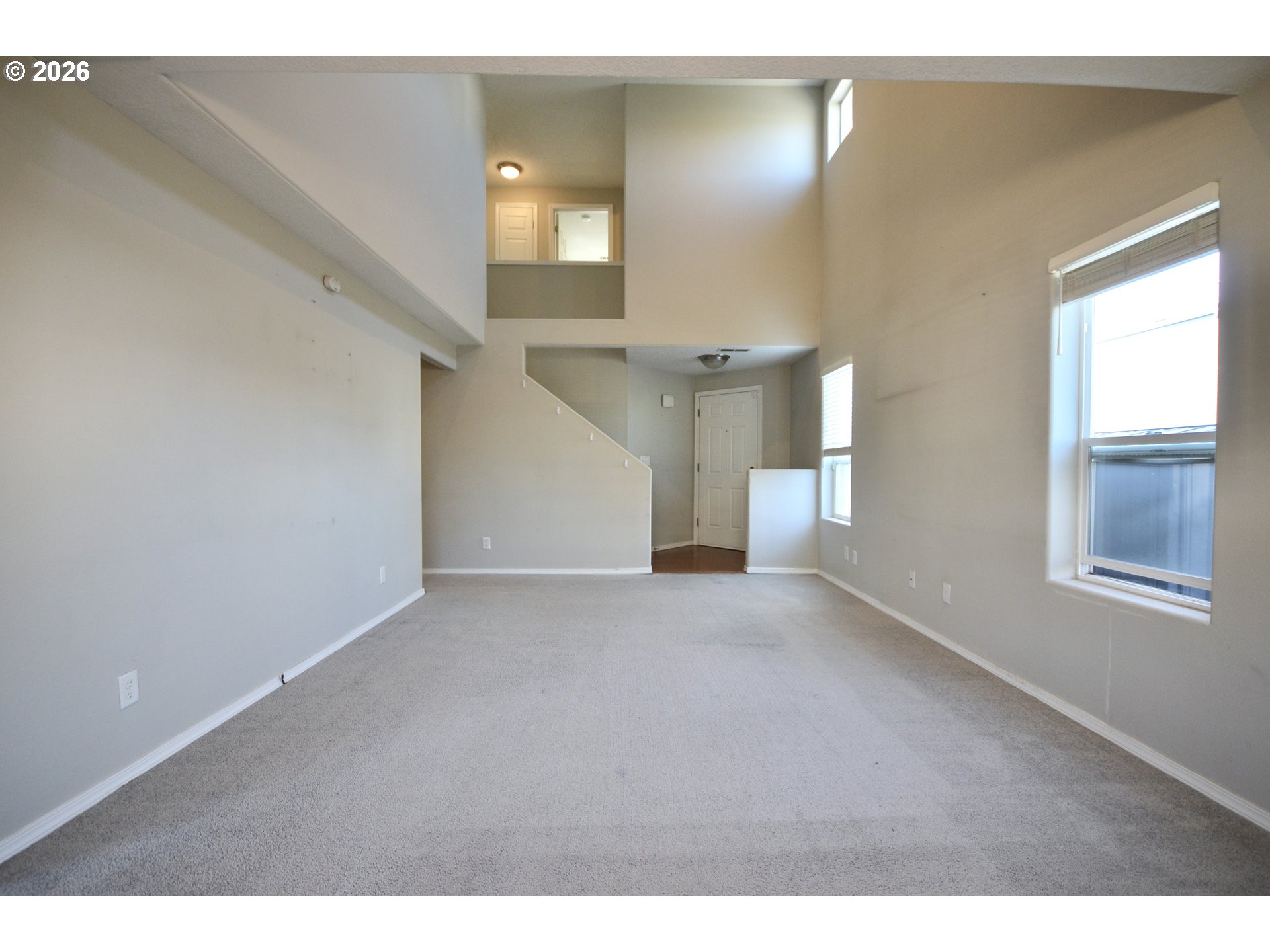 20583 Southwest Tesoro Court Beaverton, OR 97003 - Photo 5 of 28 a view of an empty room with a window