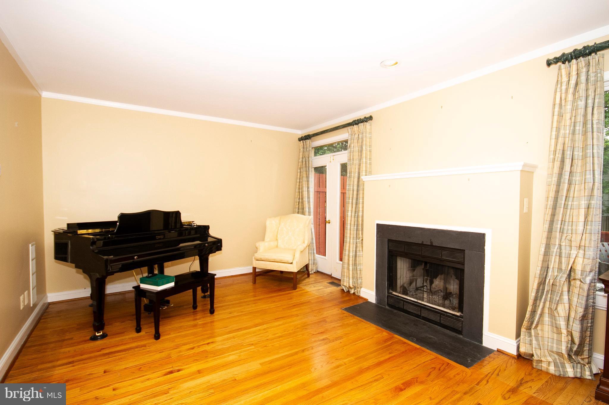 5205 Downing Road Baltimore, MD 21212 - Photo 8 of 29 Living Room with wood burning fireplace