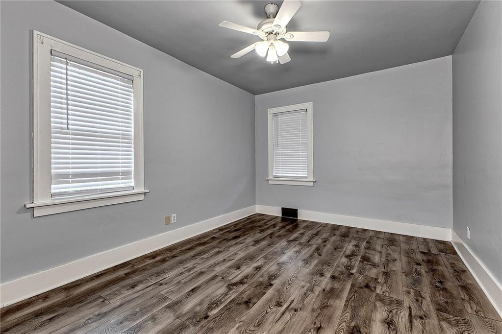 19 Lilly Lane Manor, PA 15665 - Photo 14 of 43 a view of empty room with wooden floor and fan