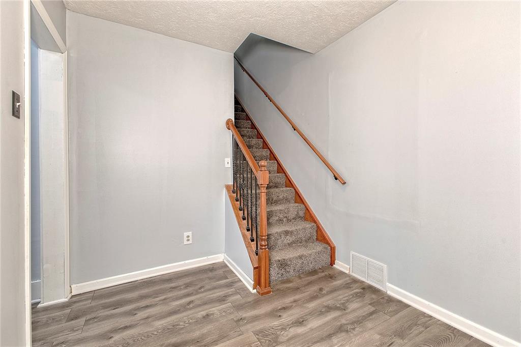 19 Lilly Lane Manor, PA 15665 - Photo 17 of 43 a view of an entryway with wooden floor