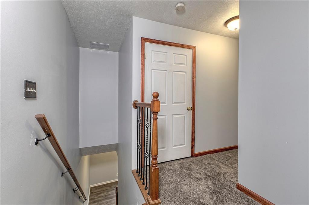 19 Lilly Lane Manor, PA 15665 - Photo 18 of 43 a view of a livingroom with stairs