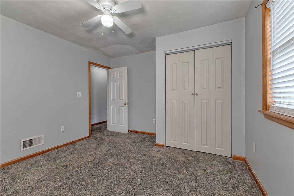19 Lilly Lane Manor, PA 15665 - Photo 28 of 43 a view of an empty room and window