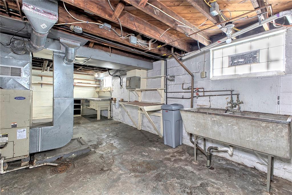 19 Lilly Lane Manor, PA 15665 - Photo 37 of 43 a view of a kitchen with appliances and cabinets