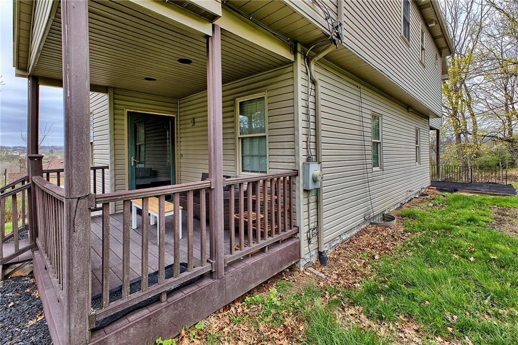 19 Lilly Lane Manor, PA 15665 - Photo 38 of 43 a view of a wooden house with a small yard