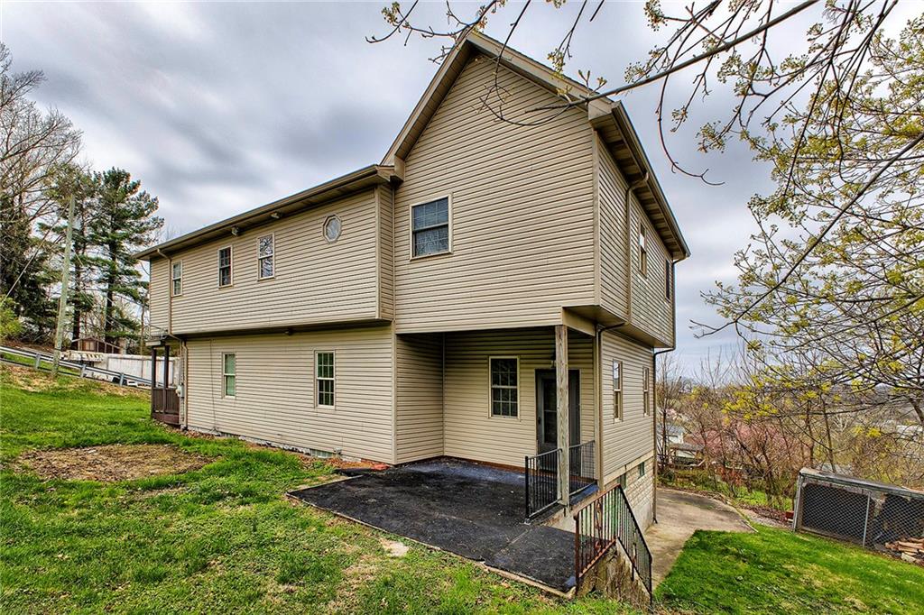 19 Lilly Lane Manor, PA 15665 - Photo 39 of 43 a front view of a house with a yard