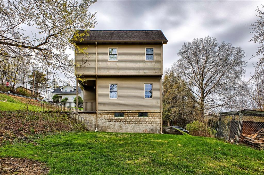 19 Lilly Lane Manor, PA 15665 - Photo 40 of 43 a view of a house with a yard