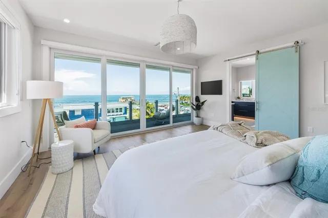 a bathroom with a sink a window and a mirror