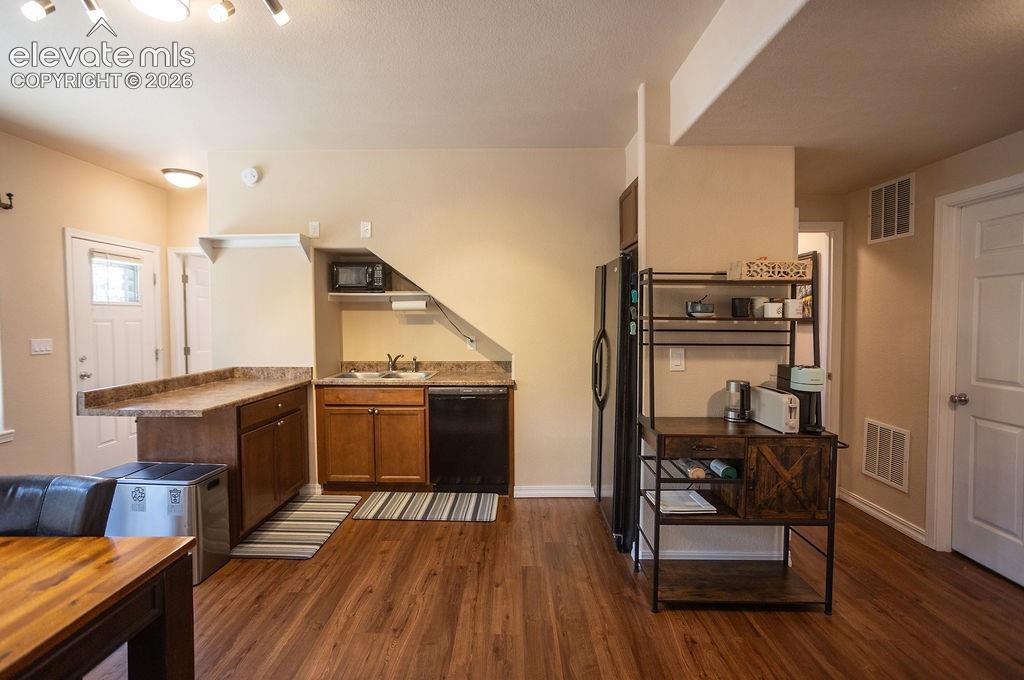 45 Valley Circle Divide, CO 80814 - Photo 17 of 42 a open kitchen with a table and chairs in it