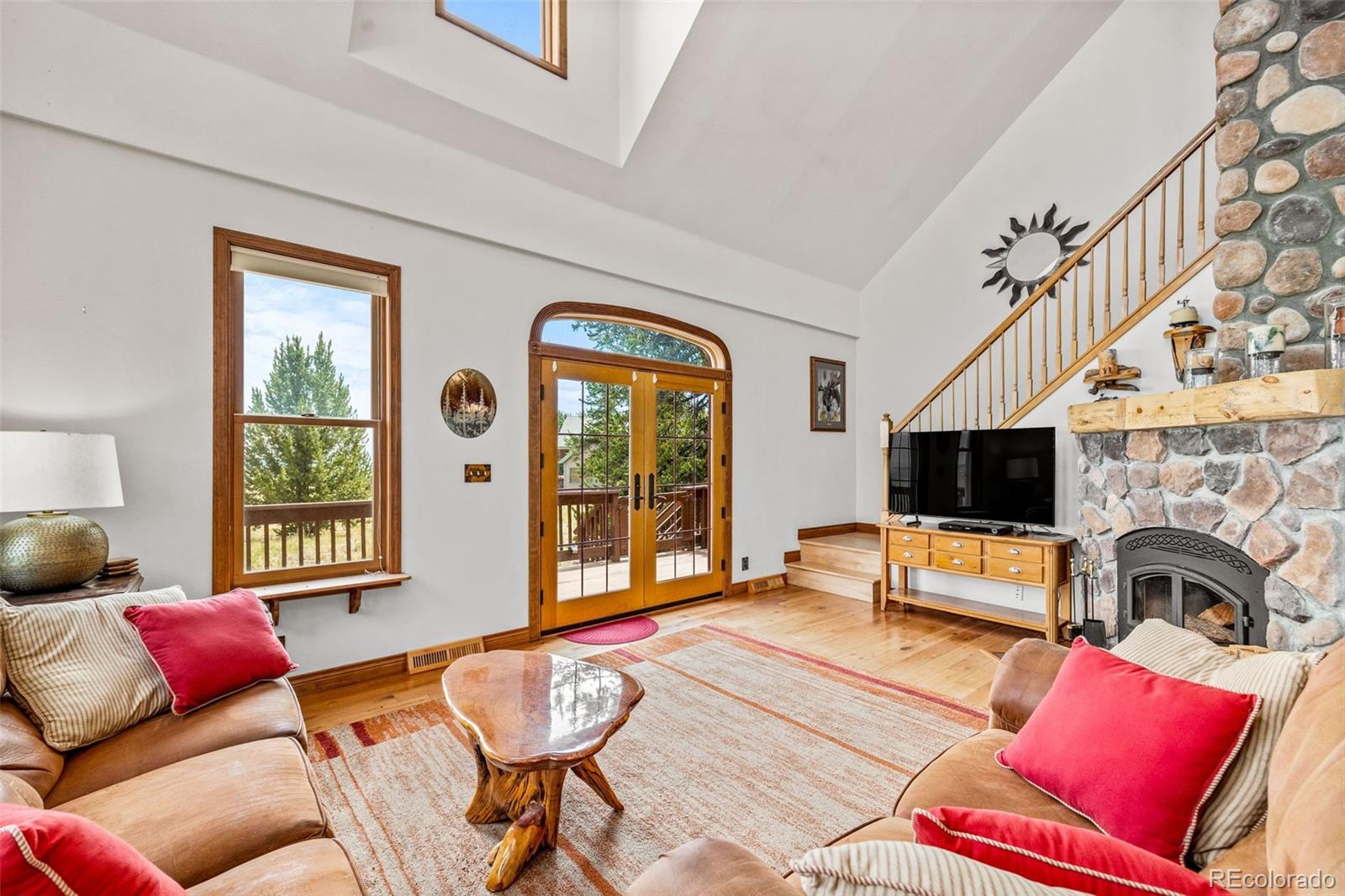 2020 Mullenville Road Fairplay, CO 80440 - Photo 11 of 49 a living room with furniture fireplace and flat screen tv
