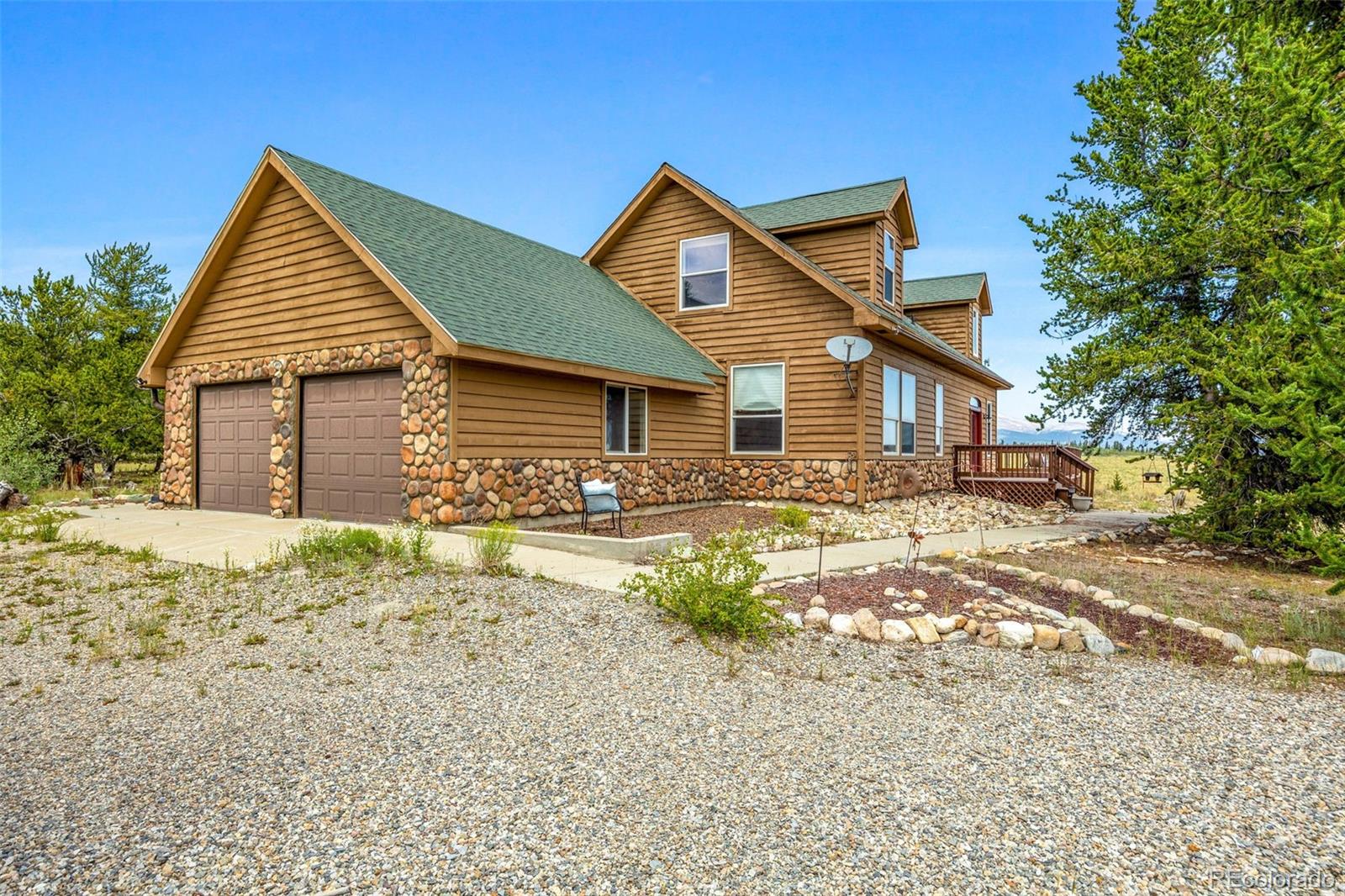 2020 Mullenville Road Fairplay, CO 80440 - Photo 3 of 49 a front view of a house with a yard
