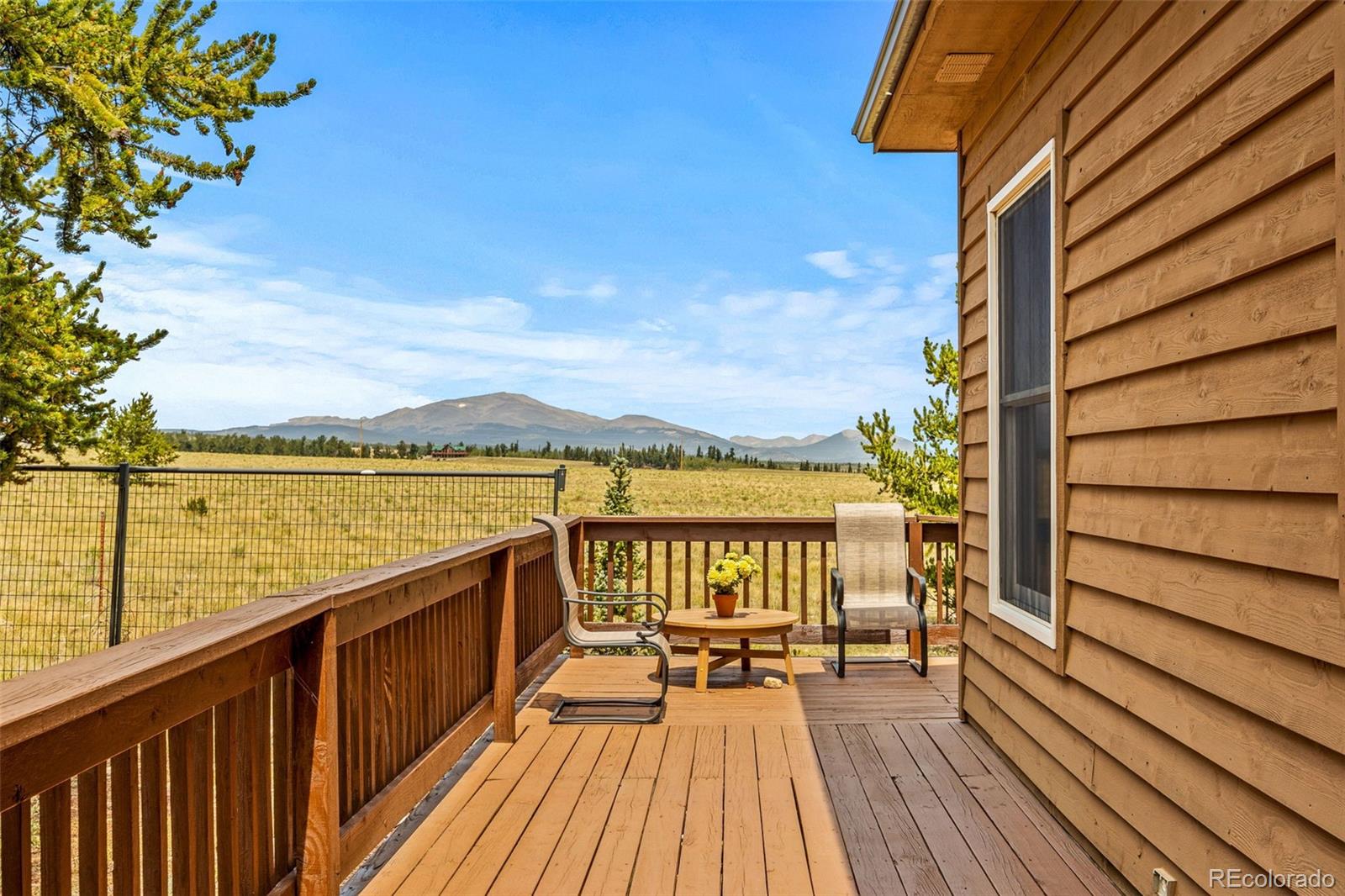 2020 Mullenville Road Fairplay, CO 80440 - Photo 9 of 49 a view of balcony with wooden floor and outdoor space