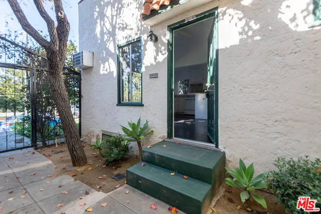 a backyard of a house with seating space