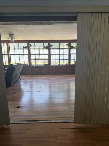 a bedroom with a bed and cabinets