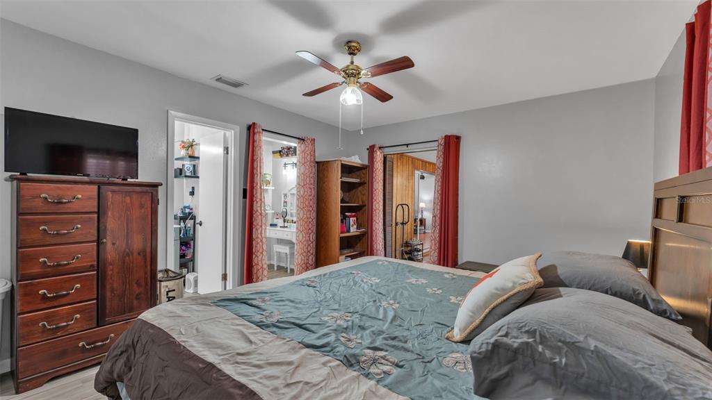 115 Morrow Circle Brandon, FL 33510 - Photo 13 of 48 a living room with furniture and a flat screen tv