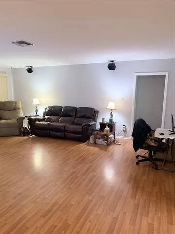 a room with furniture and a window