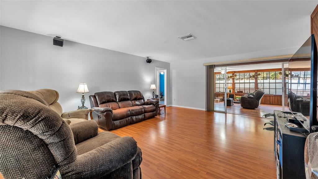 115 Morrow Circle Brandon, FL 33510 - Photo 22 of 48 a living room with furniture and a large window